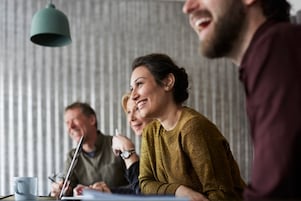 Vrouwelijke manager in business meeting.