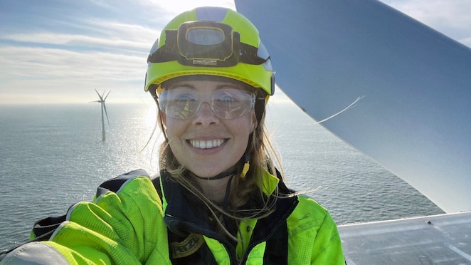 Dagmar Eisses on top of a wind turbine of Shell NoordzeeWind