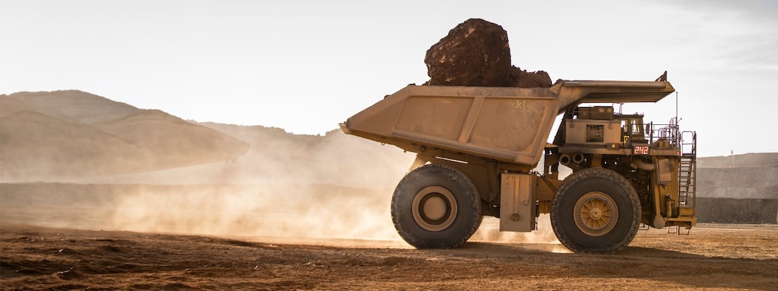A giant truck in a mine. The left third of this photo has been added using Adobe Photoshop AI for the sole purpose of size-fitting the photo frame in the English version of this story