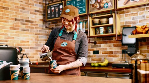 A barista in a Shell Café, a promotional photo made for a.o. the Dutch market (Photo: Richard Clatworthy)
