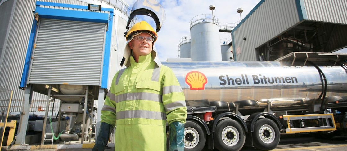Truck driver with Shell bitumen tank