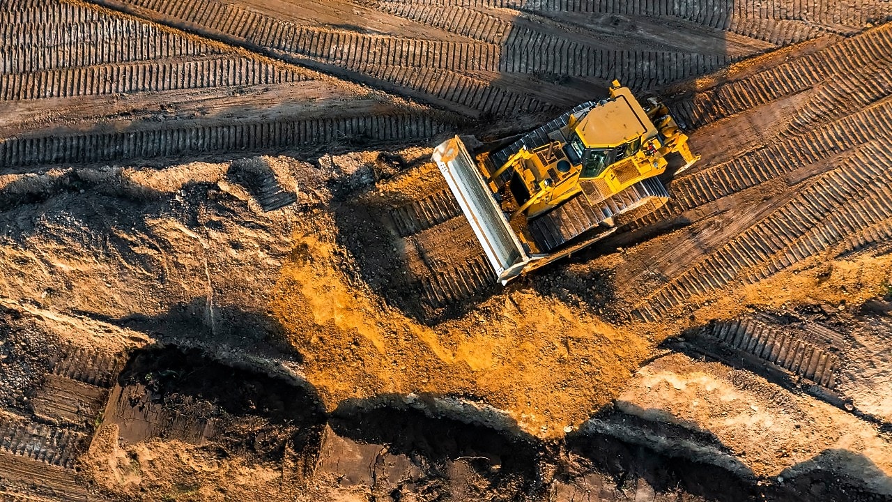 Bulldozer op bouwterrein