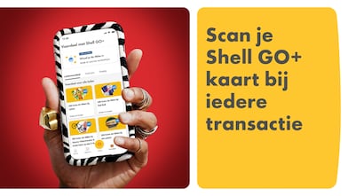 Man using phone at a Shell Recharge Station