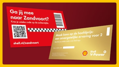 Man using phone at a Shell Recharge Station